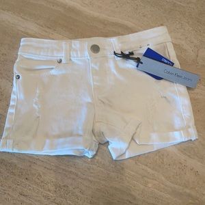 Girls Calvin Klein white distressed shorts